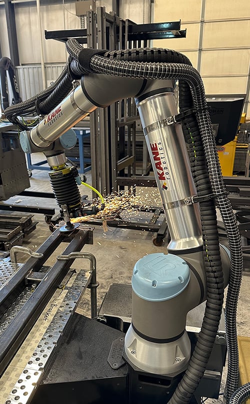 Kane Robotics’ GRIT ST cobot sanding metal components.