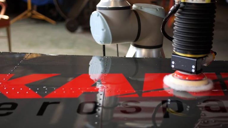 Kane Robotics’ GRIT ST polishing a propeller blade.